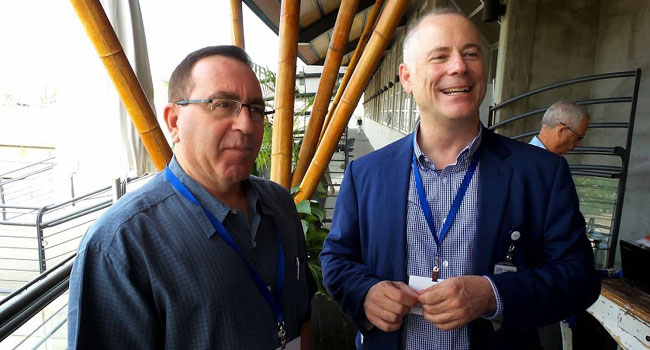 מימין: נתן לואו, Archangel;  וד"ר עודד מירב, מנהל מרכז הטכנולוגיות של GE בישראל